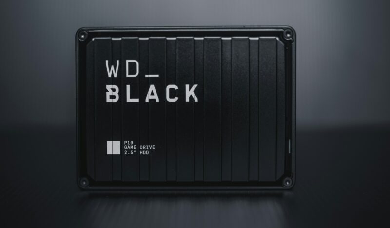 WD Black P10 Game Drive 2TB Black external hard drive on a black background