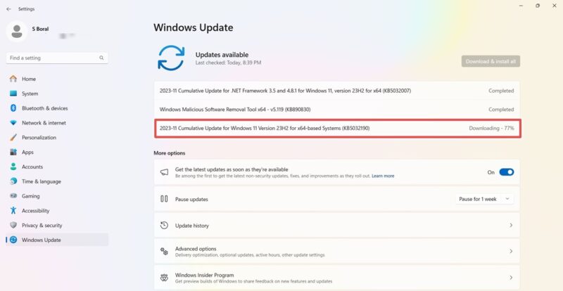 Windows 11 23H2 version KB5032190 being downloaded.