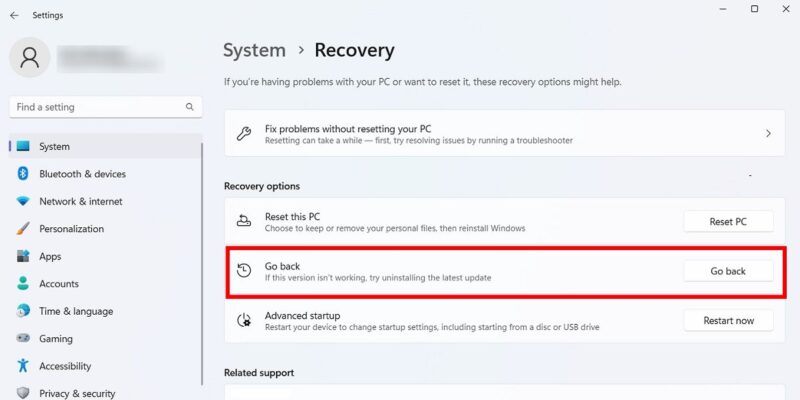 "Go back" option under Recovery in Windows.