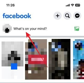 Tapping on "What's on your mind" bar in Facebook iOS app.
