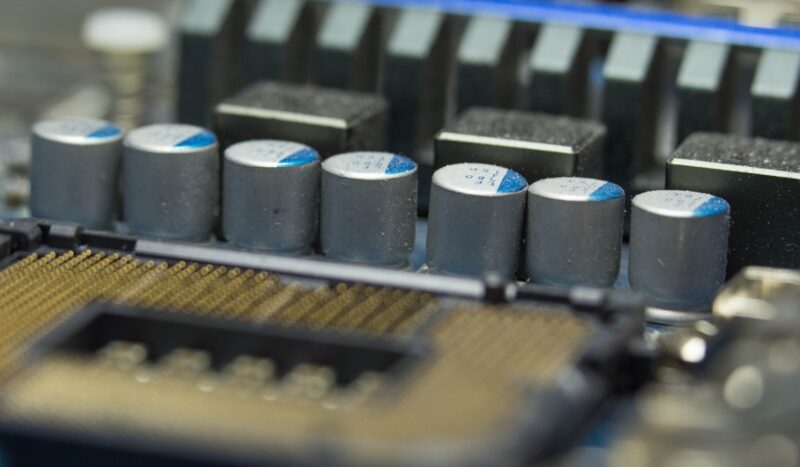 Closeup of motherboard vrm showing capacitors