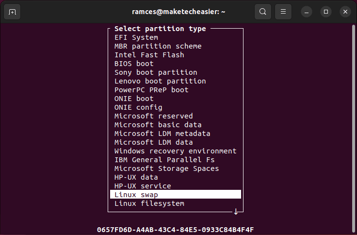 A terminal showing the process of changing the partition type in cfdisk.