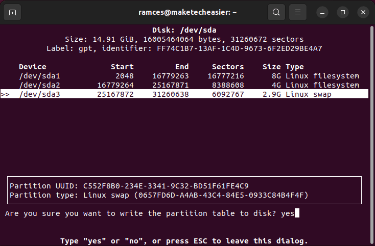 A terminal showing the commit process for cfdisk.