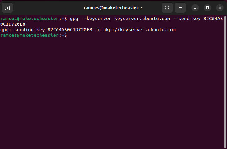 A terminal showing the process of uploading a public key to a keyserver.