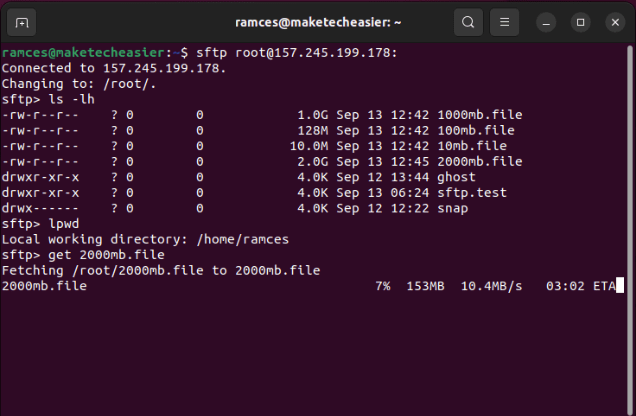 A terminal showing the SFTP prompt transferring files from a remote server back to a local machine.